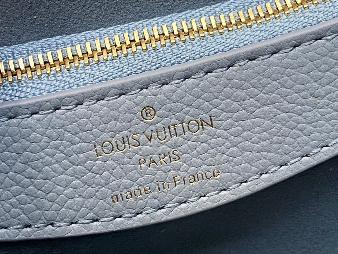 diane 24 light blue monogram empreinte leather