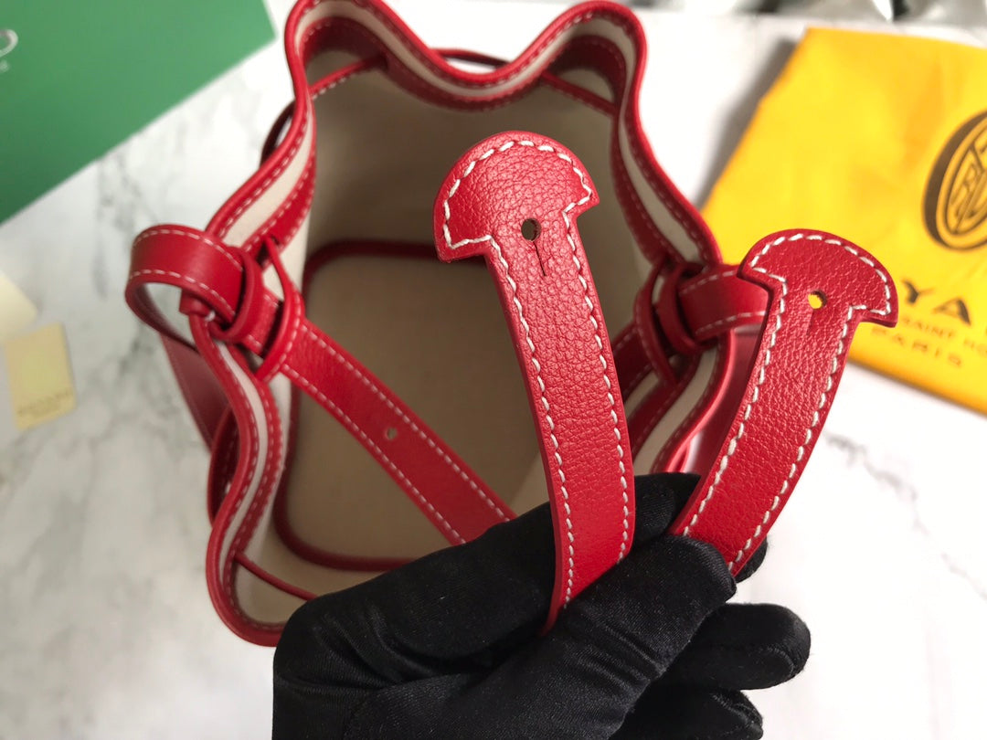 PETIT FLOT BUCKET BAG 22 IN CLASSIC RED GOYARDINE CANVAS AND LAMBSKIN TRIM