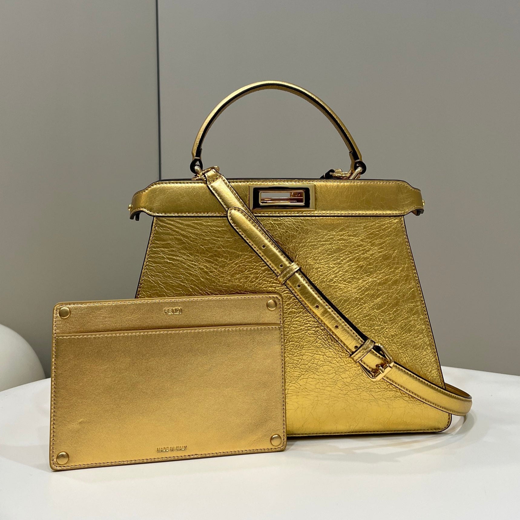 PEEKABOO ISEEU 33 IN GOLD METALLIC CALFSKIN GOLD HARDWARE