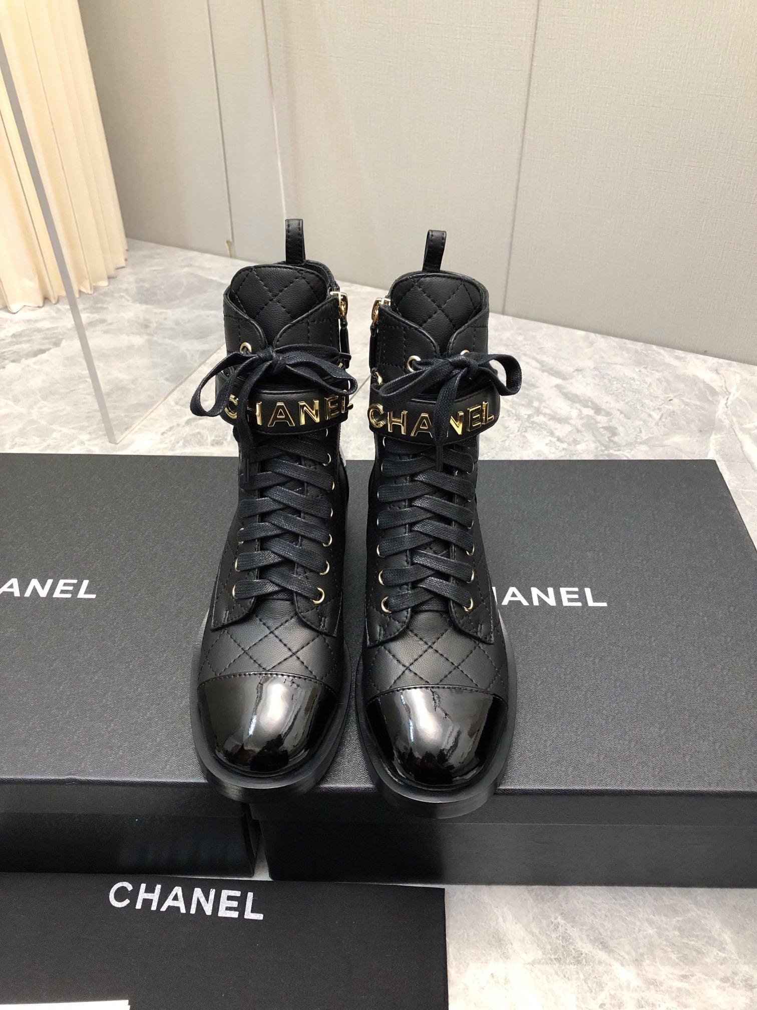 CC Short Boots 45mm In Black Quilted Lambskin And Glossy Cowhide 950042