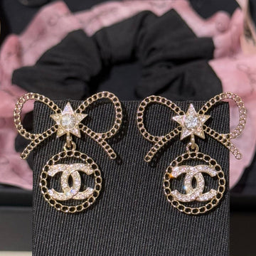 Chanel Light Gold Earrings With Bow Rhinestones And Stars