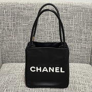 Chanel 2026 Camellia Letter Reversible Tote Bag 25cm Black White Leather