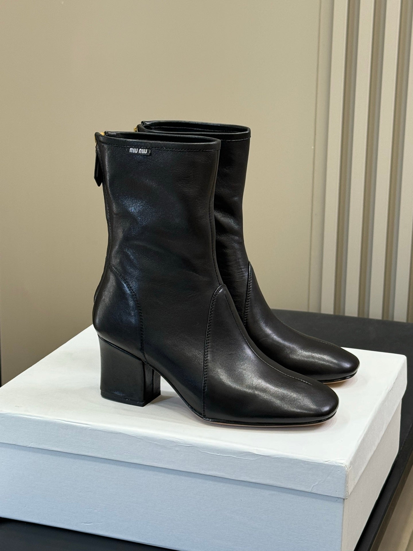 MiuMiu ankle boots black  cowhide 521946