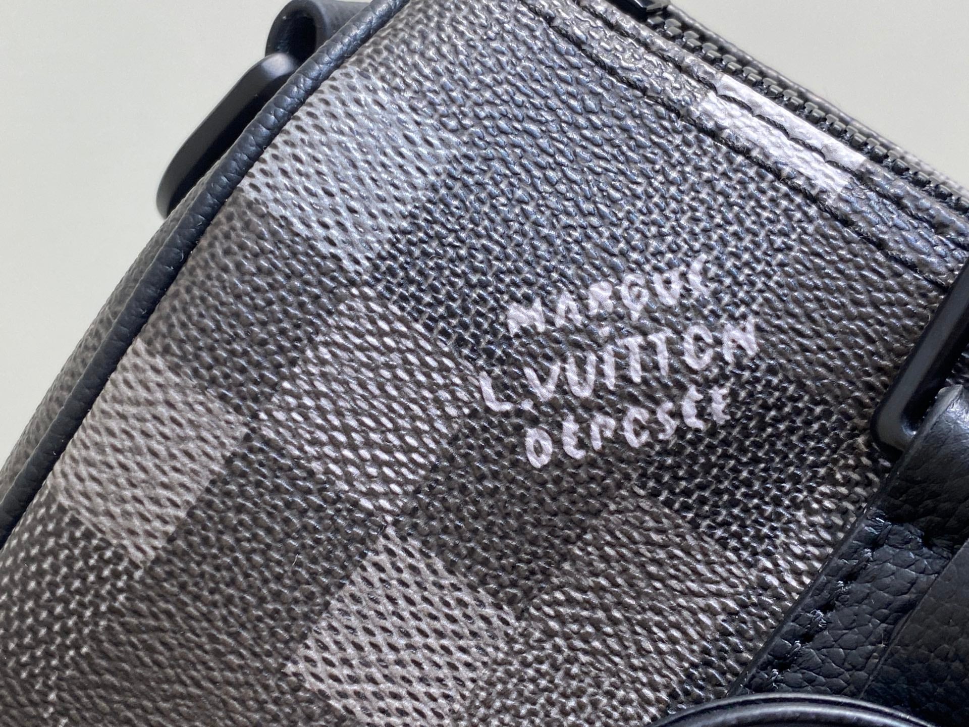 Keepall Bandouliere 25cm Damoflage Black Coated Canvas