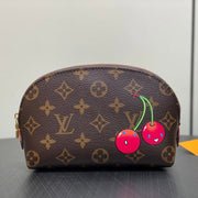LV x TM Cosmetic Pouch PM Monogram Coasted Canvas