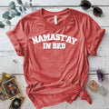 Namastay In Bed T-Shirt Mockup coral-silk